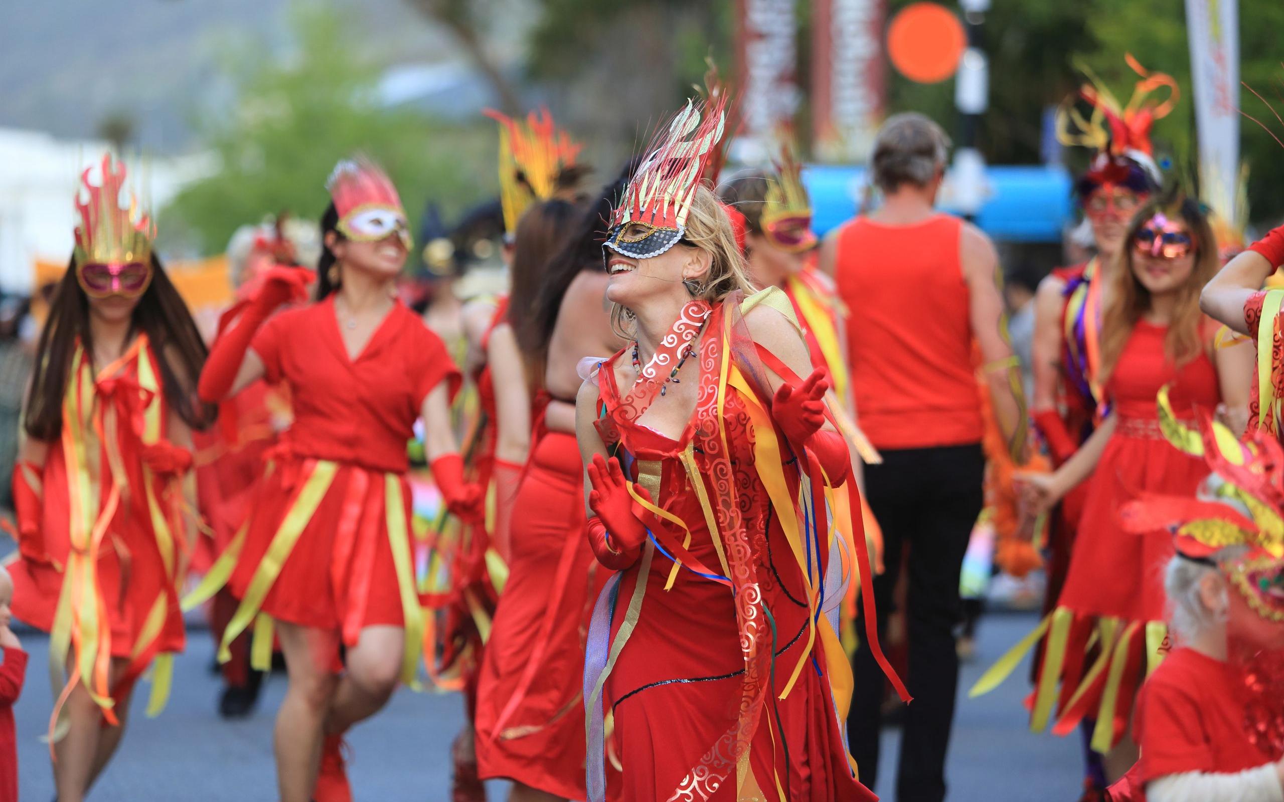 masked parade at nelson arts festival