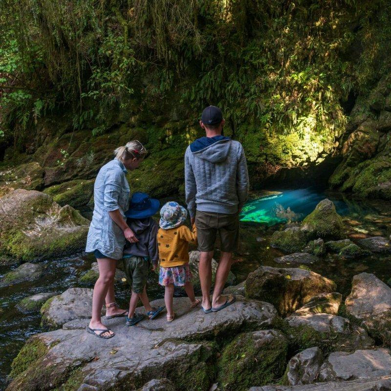 Family at Riuwaka Resurgence by Oliver Weber