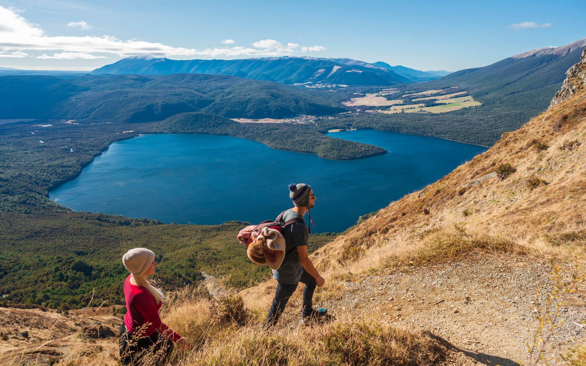 Couple hiking Mount Robert Nelson Lake National Park