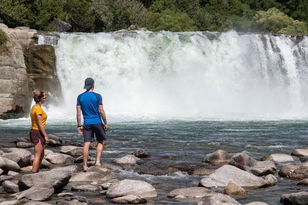 Couple standing at Maruia Falls Murchison Tasman