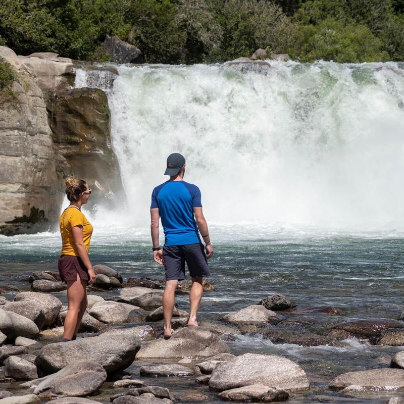 Couple standing at Maruia Falls Murchison Tasman