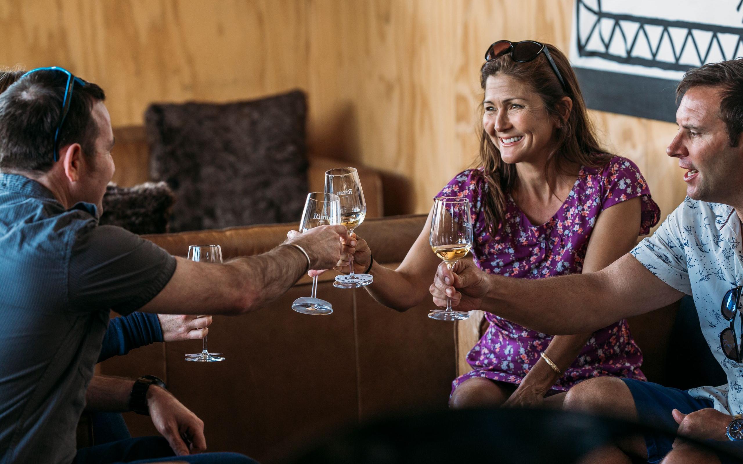 Friends at Rimu Wine Bar on Mapua Wharf