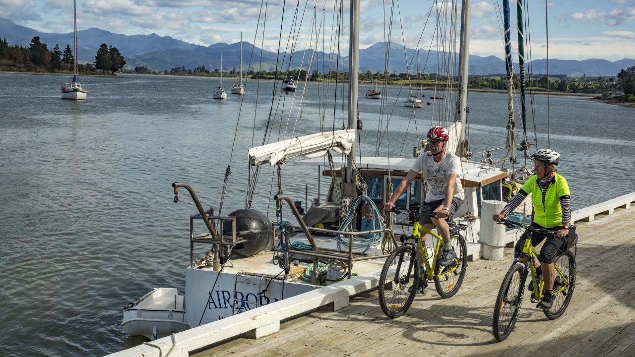 Cycling on Māpua Wharf, Great Taste Trail