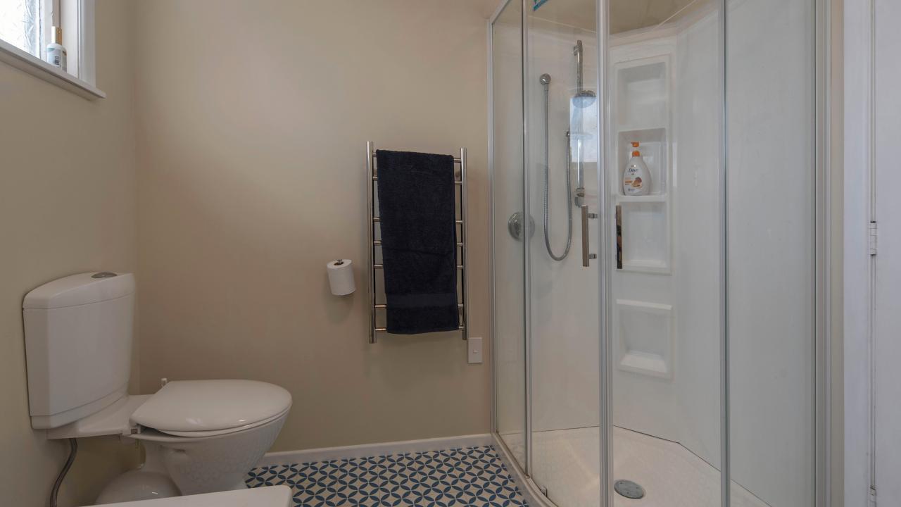 Family bathroom with shower, separate bath, toilet & vanity