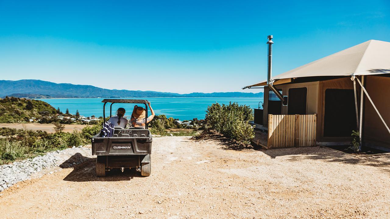 Tent Korimako; each accommodation comes with its very own electric buggy to use licensed for the road so guests can explore Tata Beach and surrounds at their own pace.