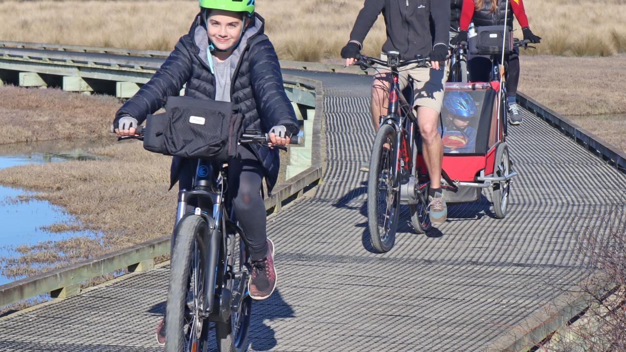 A Family enjoys a winter ride to Mapua